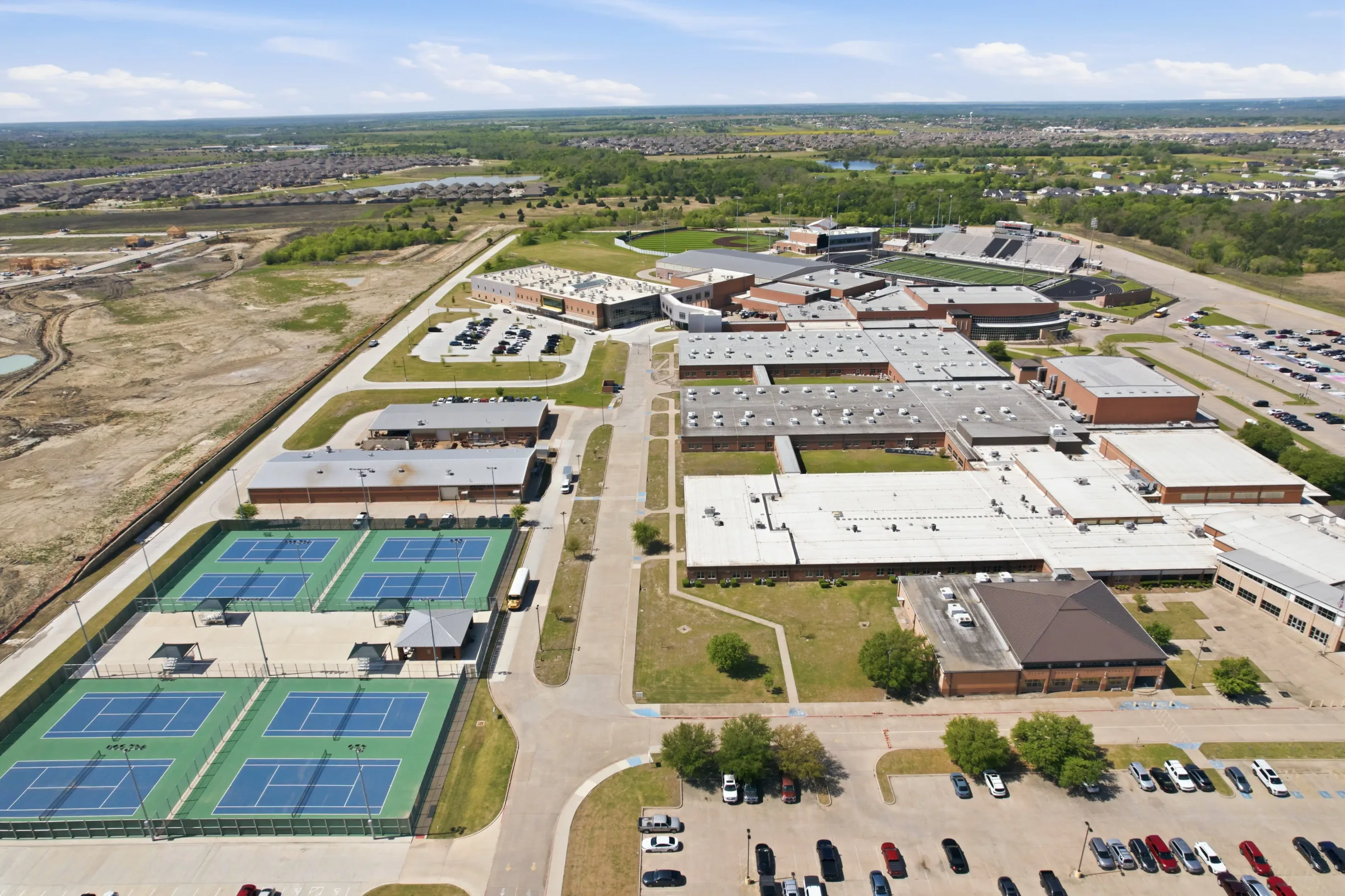 Aerial documentation of an educational campus and surrounding site