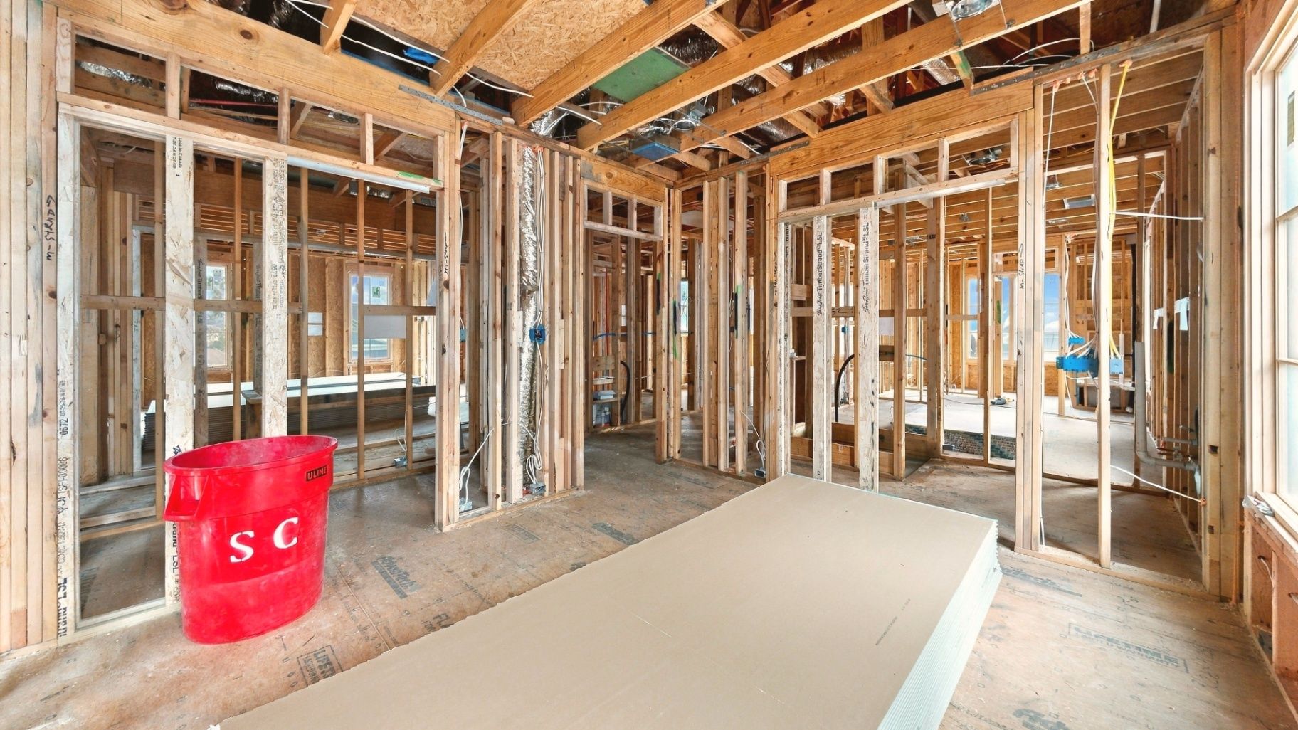 Ground-level construction documentation showing interior building conditions during construction.