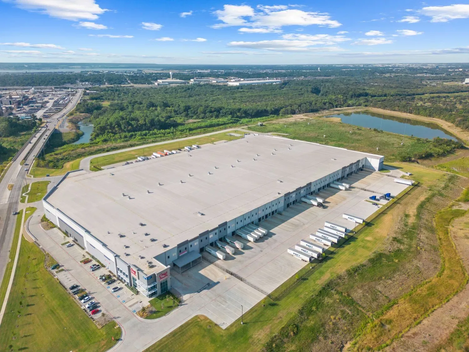 Aerial survey of a commercial warehouse facility, captured for site planning and digital twin documentation.
